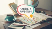 어수선한 책상 위 지도와 배달 음식 용기, 영어 사전 옆에 "Planning a road trip?" 말풍선이 떠 있는 그림, 로드 트립 계획 관련 영어 표현 학습 컨셉.