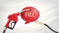 주유소 영어 표현 학습을 나타내는 주유기 노즐과 'Fill it up, please?' 말풍선 일러스트